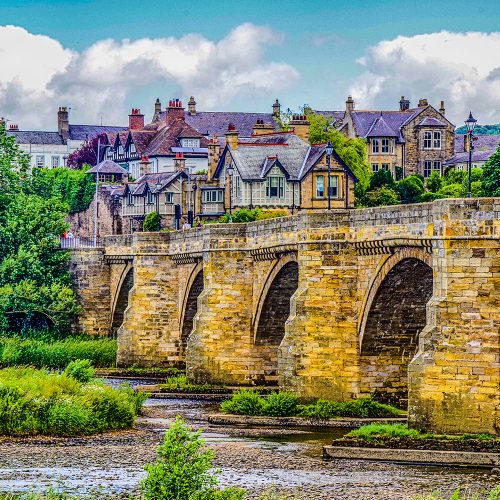 View of the bridge from the river bank at Corbridge